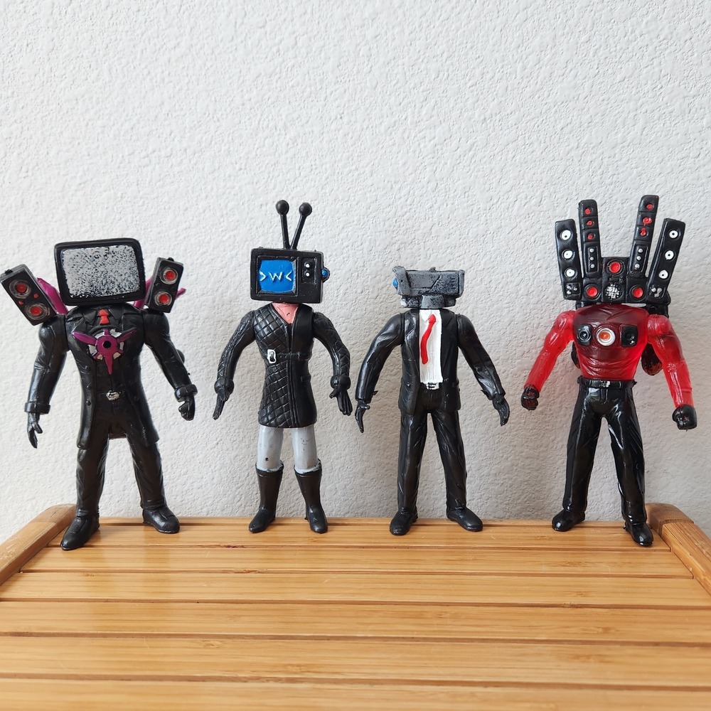 Skibidi Toilet Lot Of 4 Hard Plastic TV Man TV Woman Cameraman Speakerman Figure